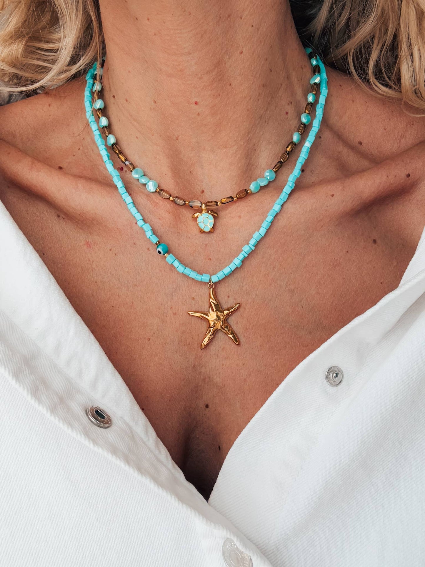 Beaded necklace with starfish and sea turtle gold charm: Starfish